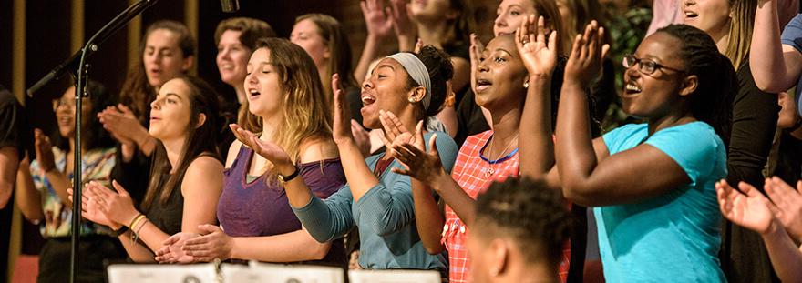 students singing in choir at chapel